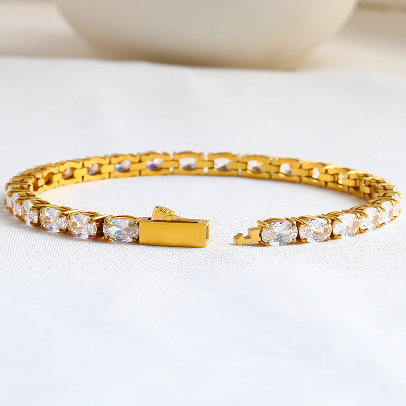 Men's Oval Light Tennis Bracelet in Gold Plated Steel – gold-tone open clasp detail