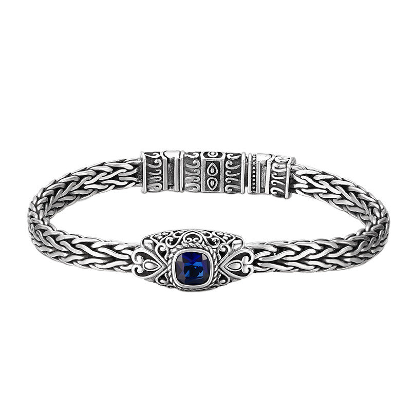 Men's Blue Scroll Braid Bracelet in Sterling Silver – front view with blue inset