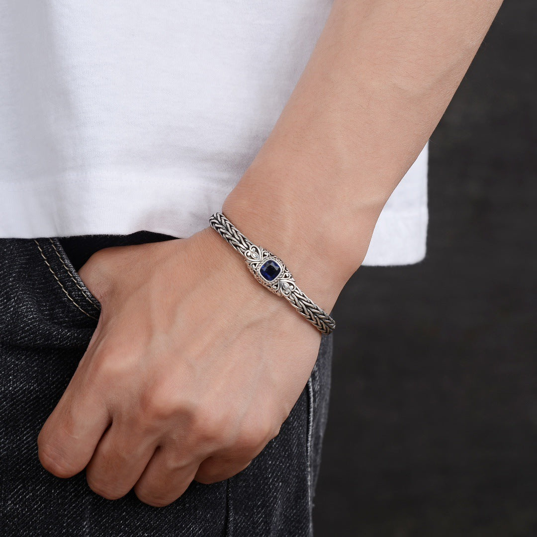 Men's Blue Scroll Braid Bracelet in Sterling Silver – contextual scene, original on wrist